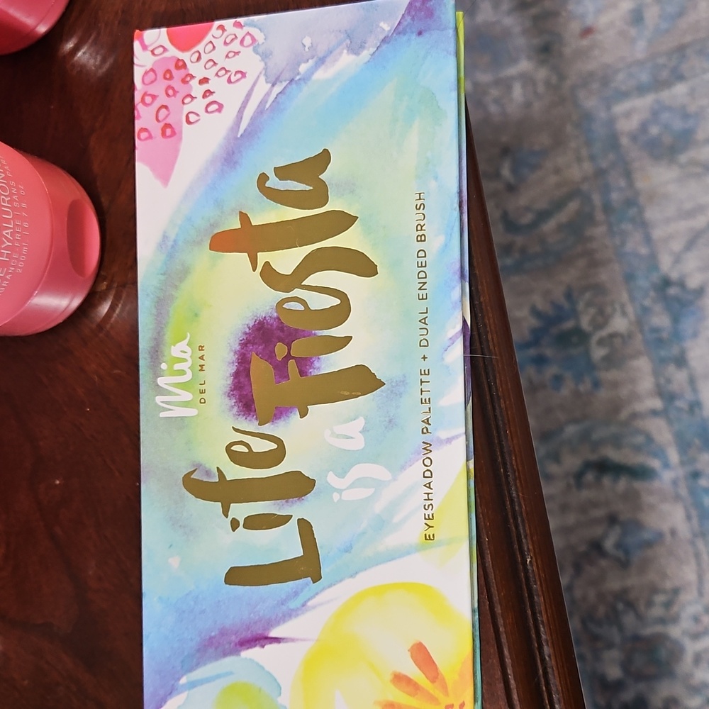 Mia Del Mar Life is a Fiesta eyeshadow pallet, with brush And Mirror